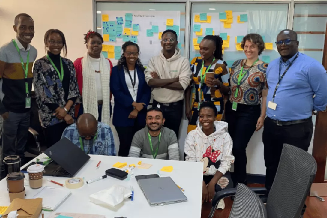 YUX, GSMA and Safaricom teams working together during the design and product iteration workshop to translate field research insights into priority opportunity areas and potential product concepts. 